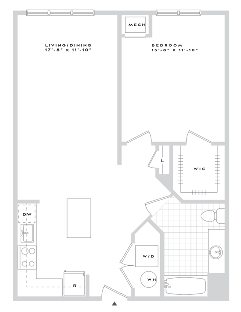 A floor plan of a living/dining area and a bedroom with a kitchenette.