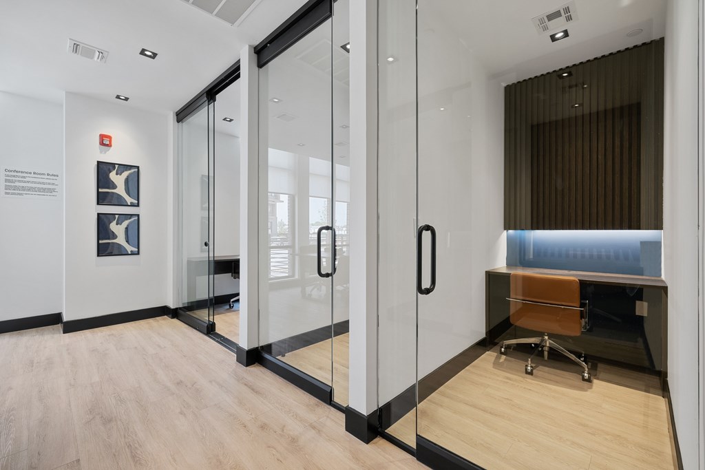 A glass door with a handle is in the image.