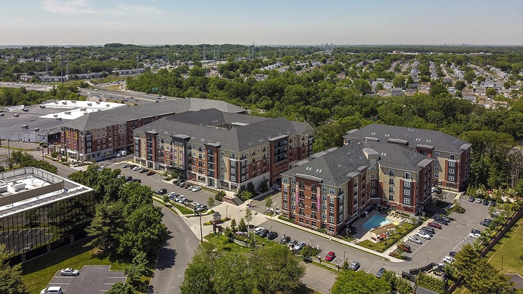 an aerial view of a large apartment complex in a city