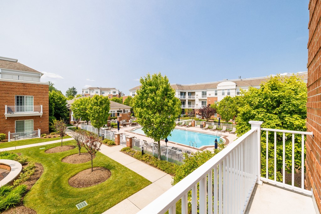 A view of a pool from a balcony.