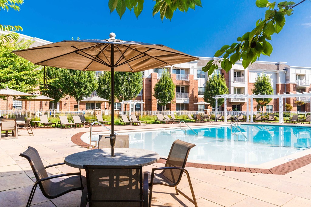 our apartments offer a swimming pool with patio furniture