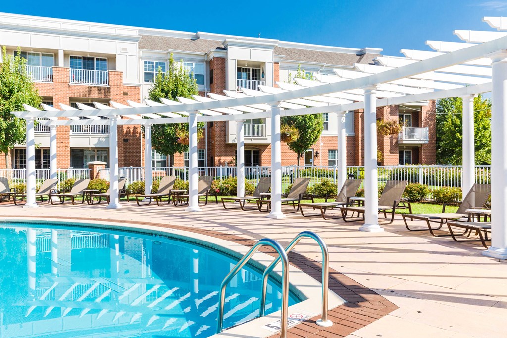 the swimming pool at the falls at rolland park apartments