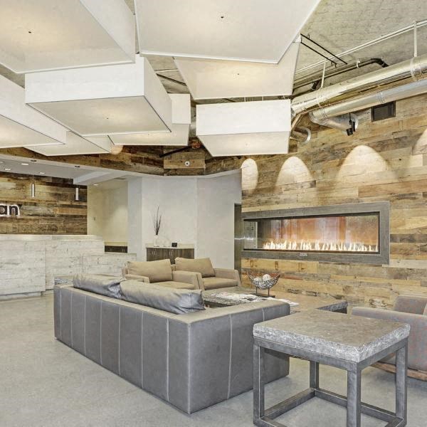 a living room with a couch and a fireplace