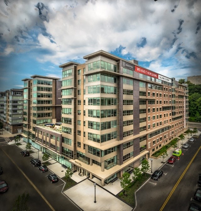 an aerial view of a large building in a city