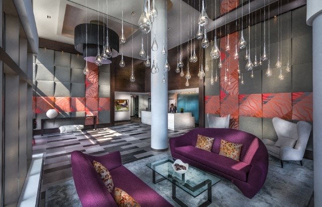 a living room with a purple couch and a table