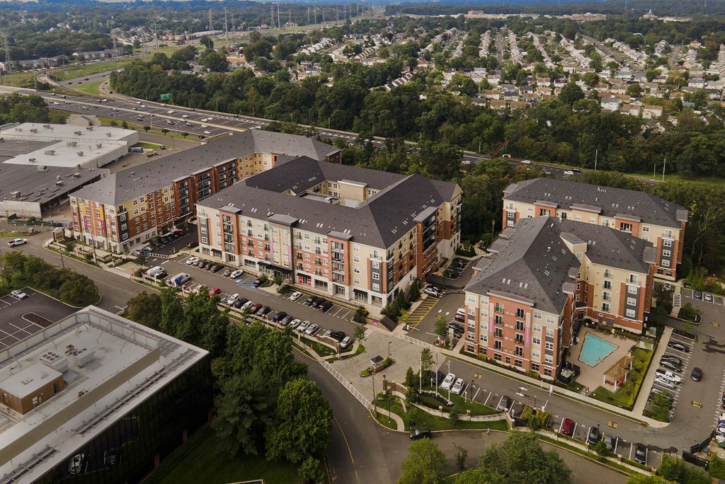 an aerial view of an apartment complex in a city
