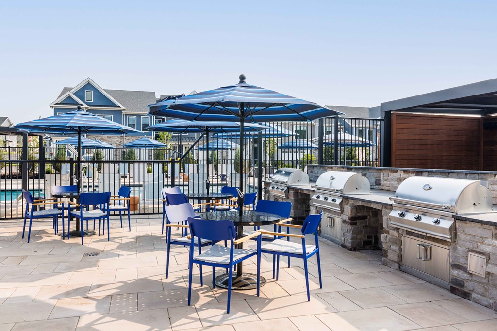 Outdoor Courtyard with Grilling Stations and Firepits