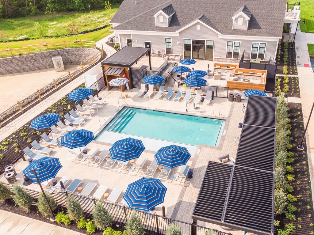 Expansive Outdoor Courtyard with Pool and Lounge Seating
