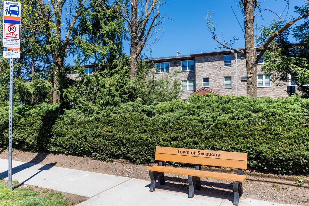 a park bench in front of a building