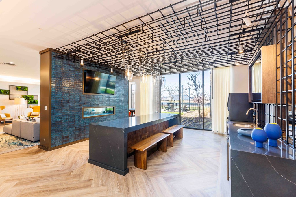 a living room with a large table and a tv