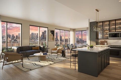 A modern kitchen with a large island and a view of the city.
