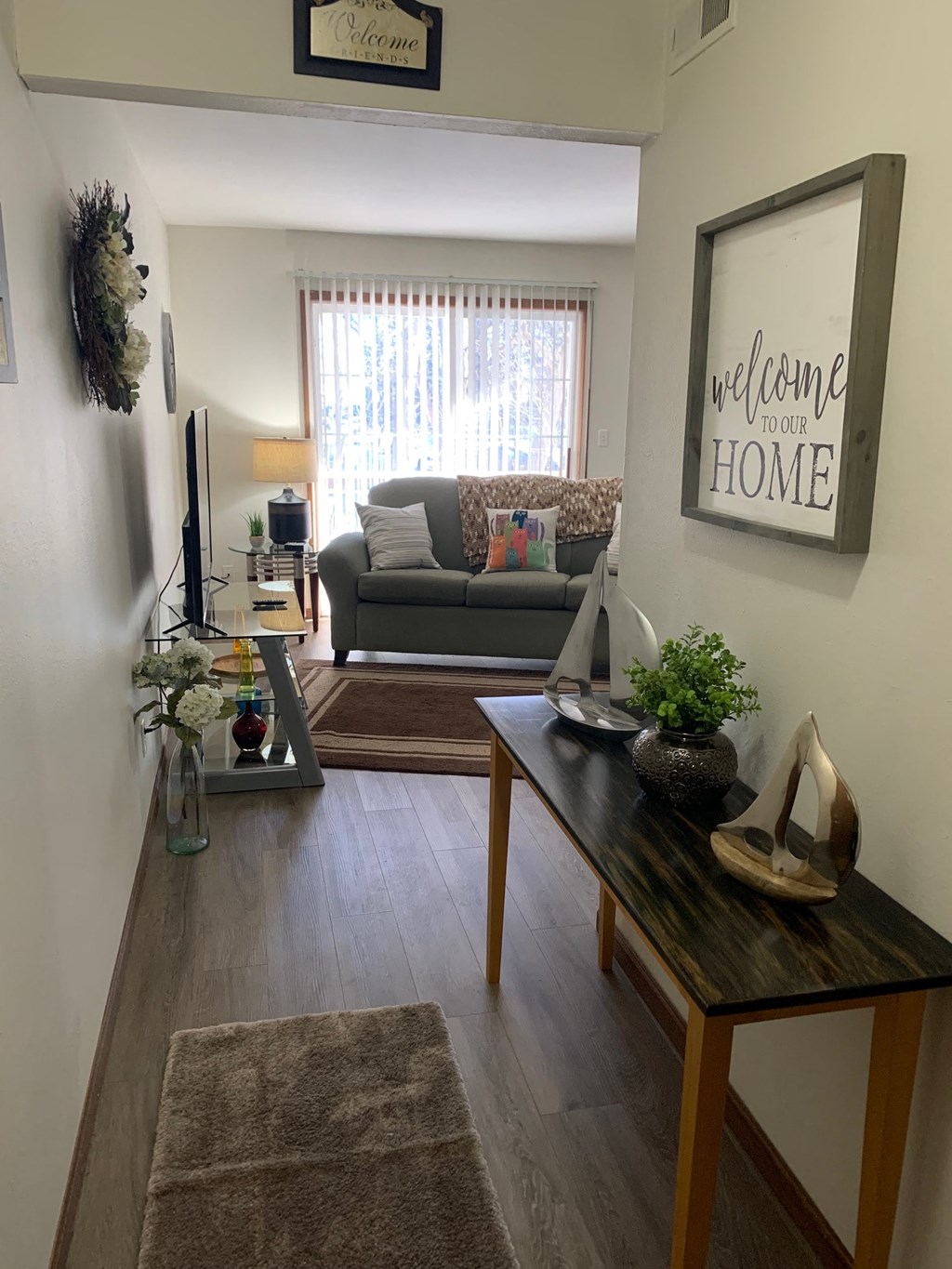 a living room with a couch and a table