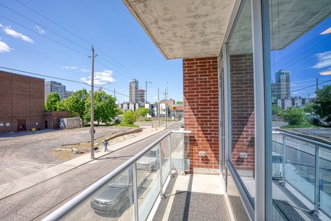 views of the city from the balcony of an apartment building