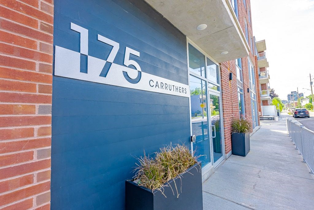 a blue building with a sign on the side of it