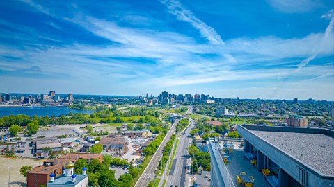 a view of the city skyline from the top of a building