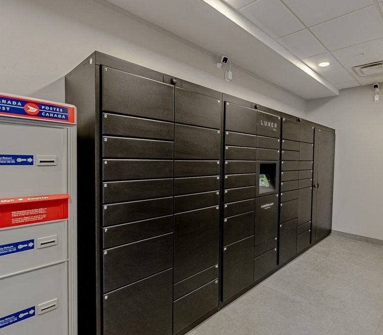 a group of metal lockers in a room