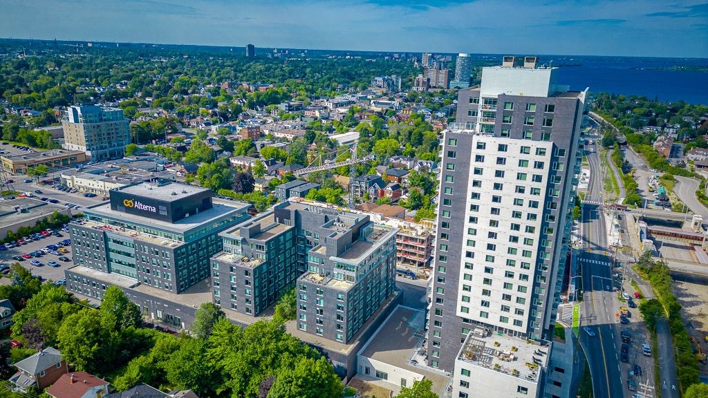 an aerial view of a city with tall buildings