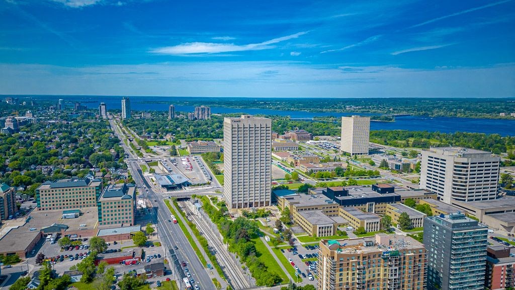 an aerial view of a city with tall buildings