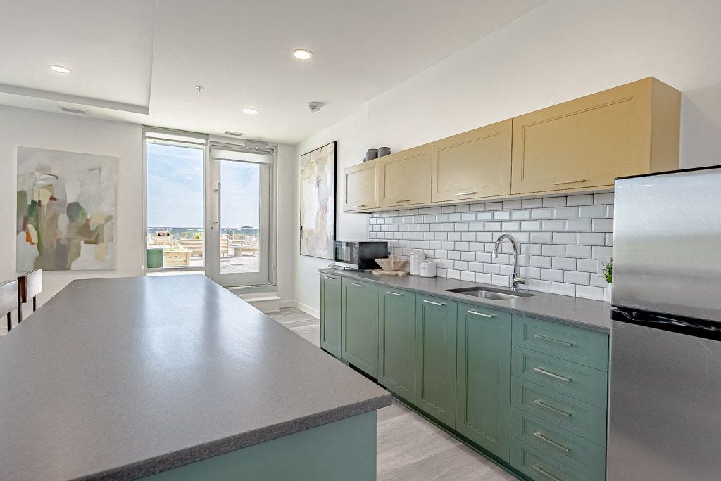 a kitchen with a counter top and a sink