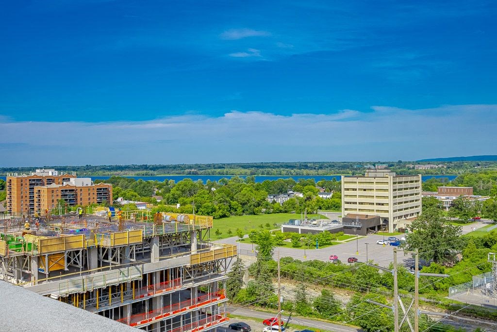 a view of a city with buildings and a body of water