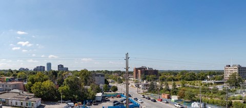 the view of the city from the roof of a building