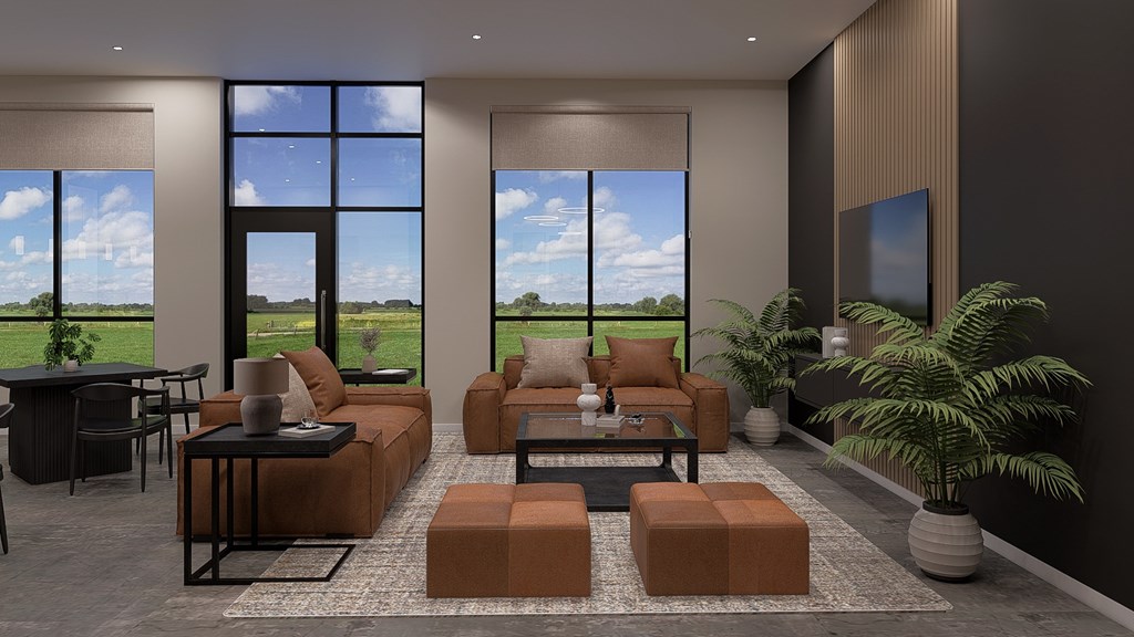 A modern living room with a large window and a view of the sky.