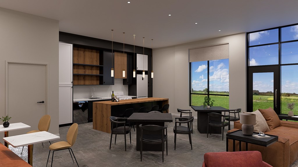 A modern kitchen and dining area with a view of the outdoors.