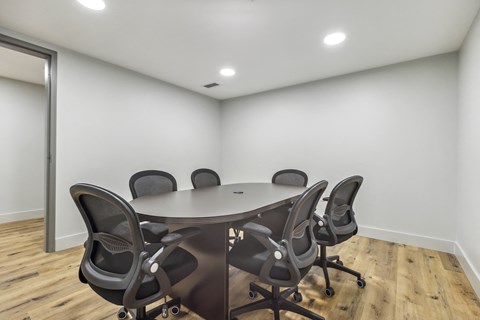 boardroom table with chairs