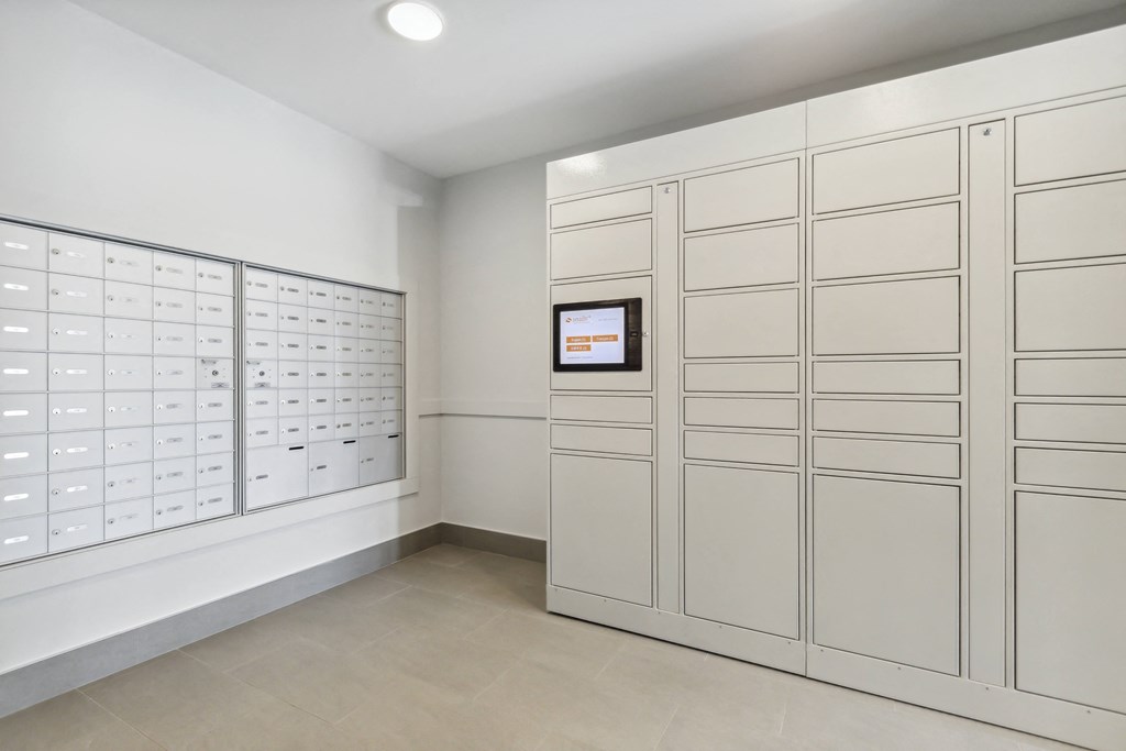 a bunch of lockers in a room with white walls