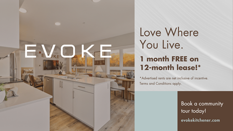 A kitchen interior with the word "EVOKE" on the wall.