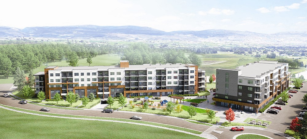 a rendering of an apartment complex with a green field and mountains in the background