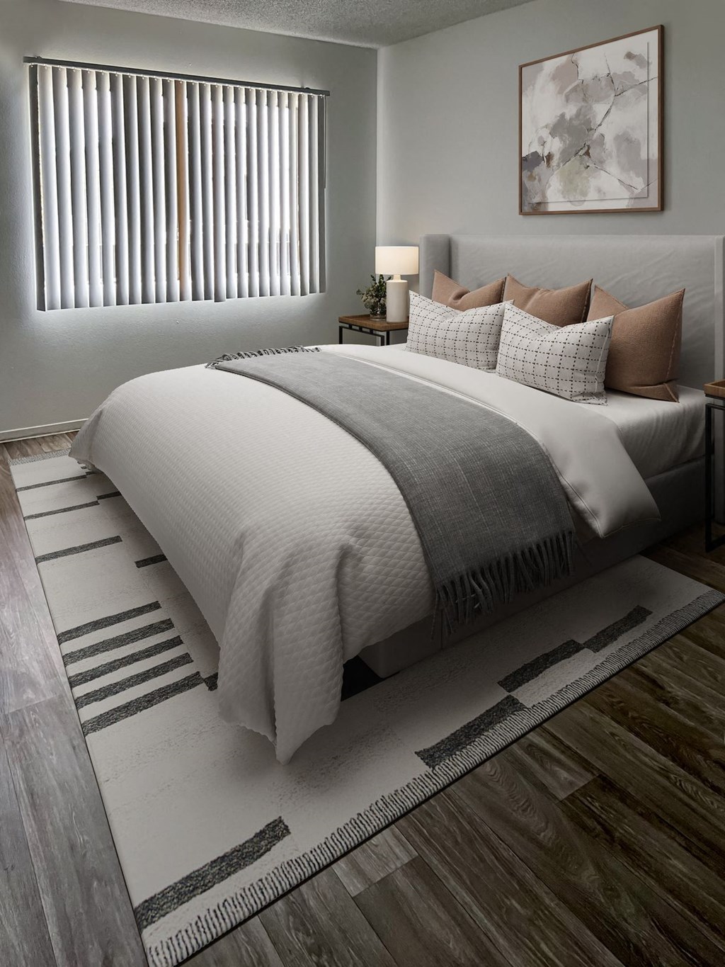 a bedroom with a bed and a rug at Evoq Apartment Homes, Nevada, 89169