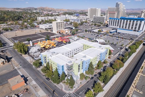 an aerial view of a city with buildings and a construction site at The Onyx at 695, Reno