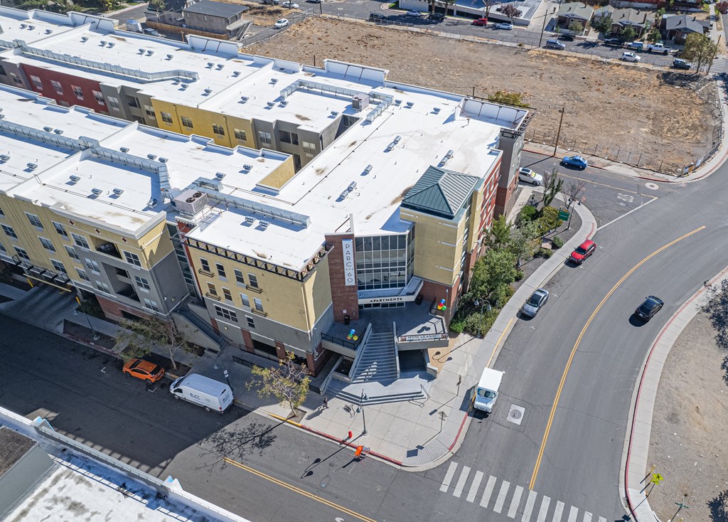 an aerial view of a city street and buildings with snow at ParcOne60, Reno, 89501