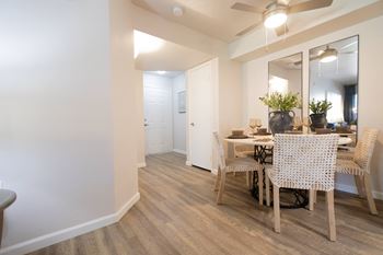 a living room and dining room with a table and chairs at Austin Crest Apartments, Nevada