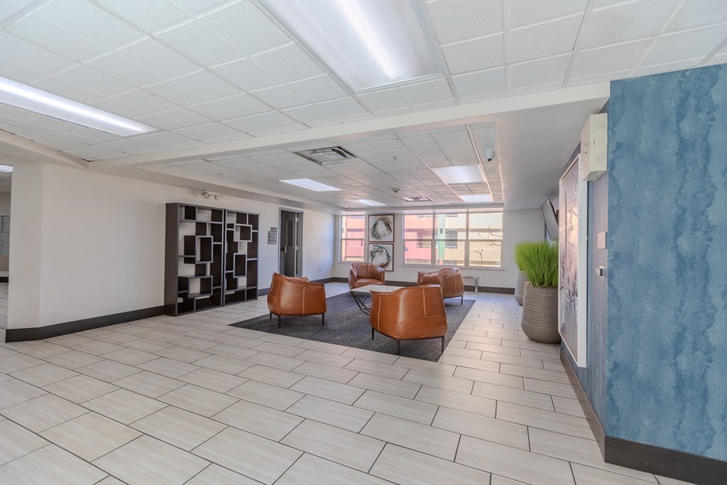an empty waiting room in a hospital with leather chairs at ParcOne60, Reno, 89501
