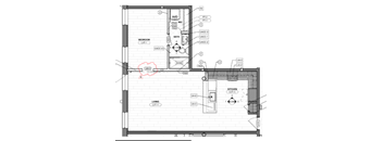 A floor plan of a house with a living room, kitchen, and bathroom.