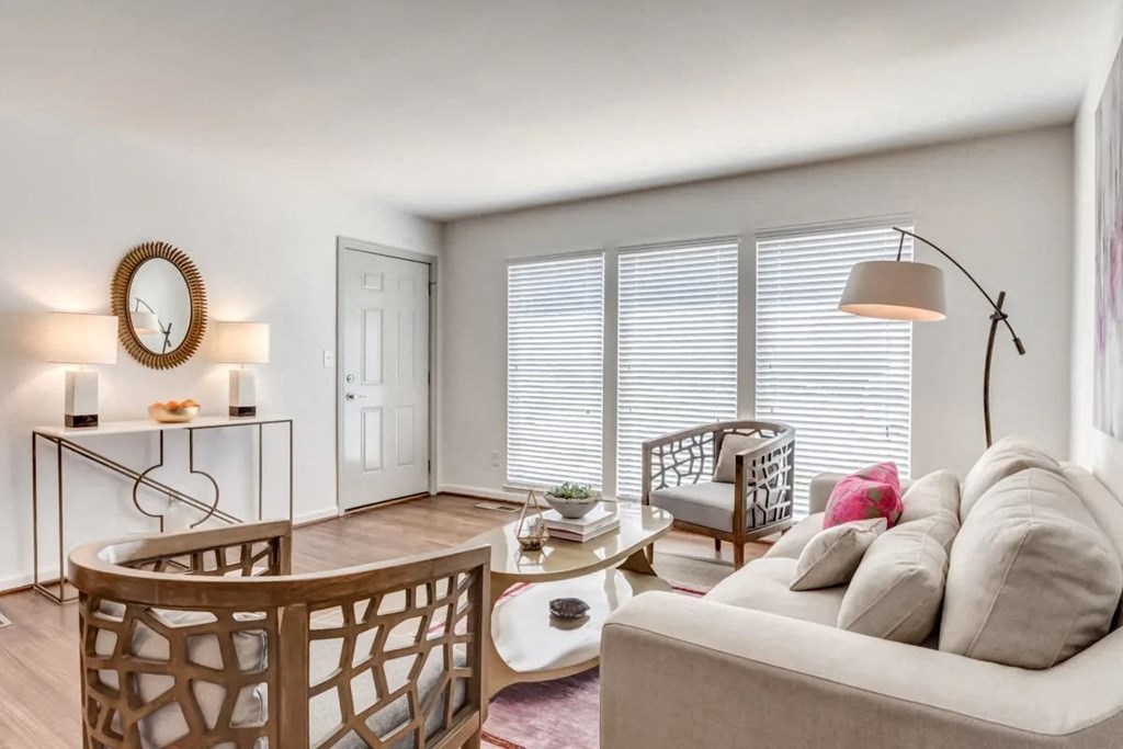 a living room with a couch and a table