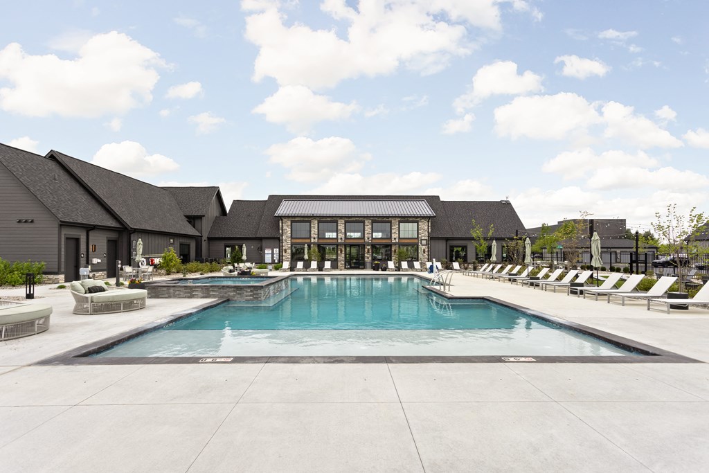 the swimming pool at the estates apartments