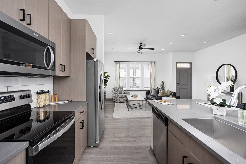 an open kitchen and living room in a house