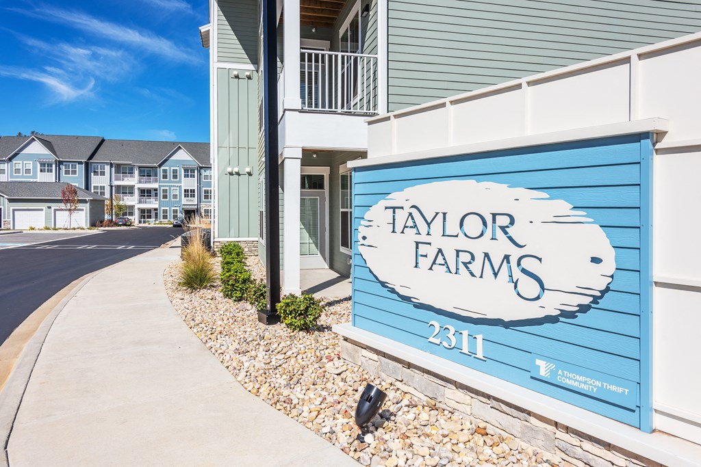 a blue building with a sign that says on it  at Taylor Farms, North Carolina, 28262