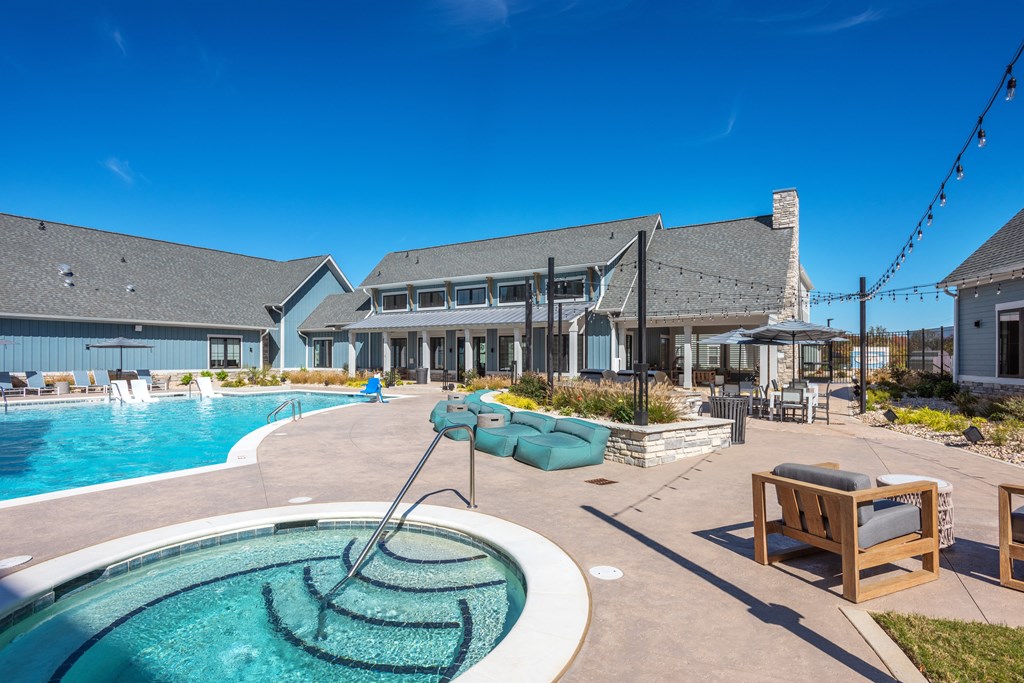 a swimming pool with a building in the background  at Taylor Farms, Charlotte, NC, 28262