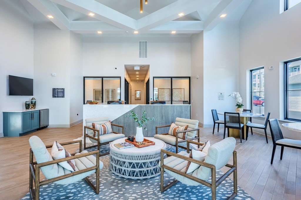 a living room with couches and chairs and a table  at Taylor Farms, Charlotte