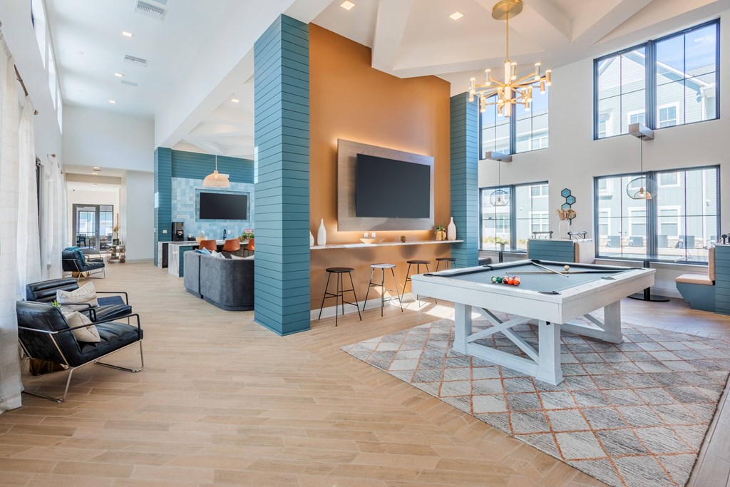 a game room with a pool table and a tv  at Taylor Farms, Charlotte, North Carolina