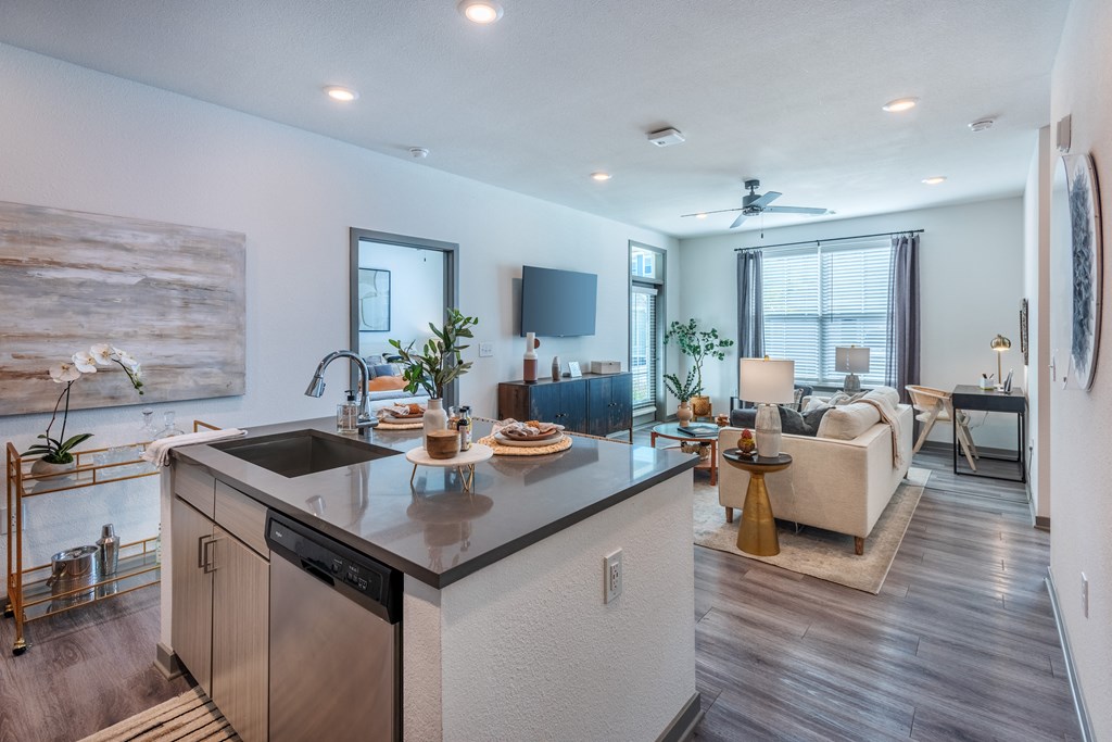 an open floor plan with a kitchen and living room  at Taylor Farms, Charlotte, 28262