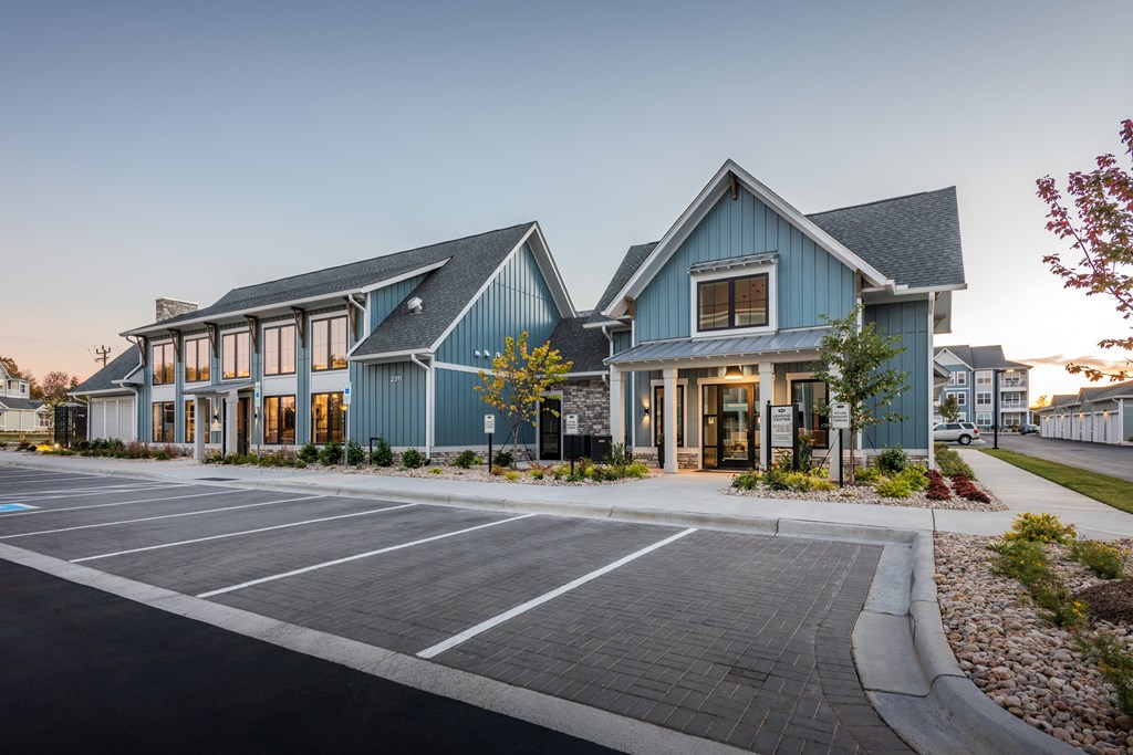 a row of houses with a street in front of them  at Taylor Farms, Charlotte, NC