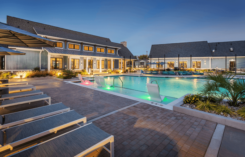 a swimming pool at night at the resort at governors residence  at Taylor Farms, Charlotte, 28262