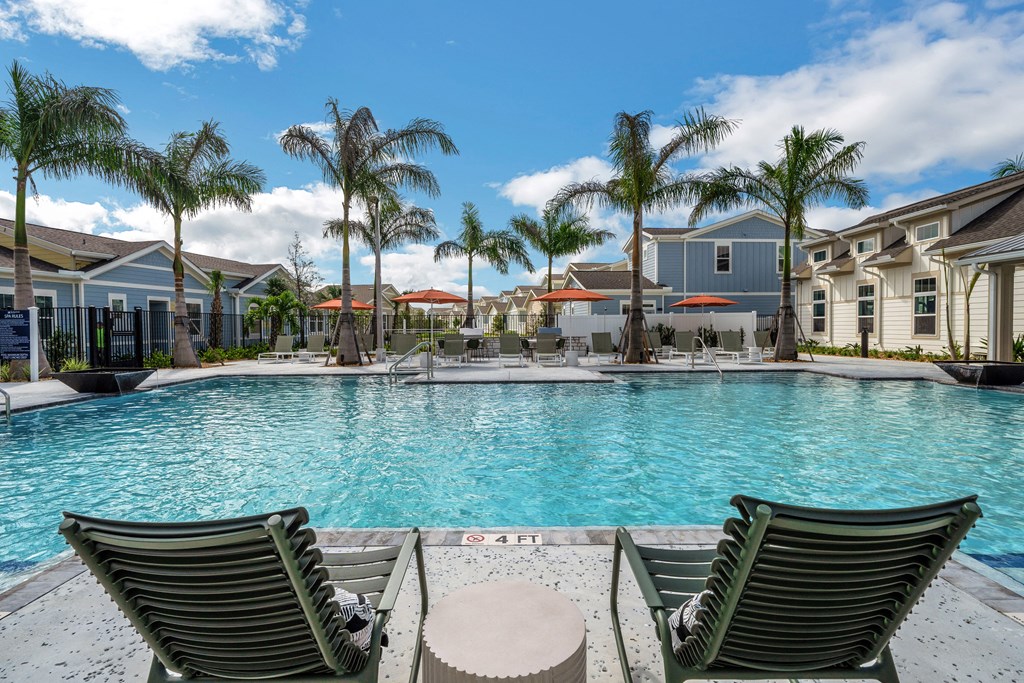 Pool With Relaxing Chairs at The Boardwalk at Tradition, Port St Lucie, FL, 34987