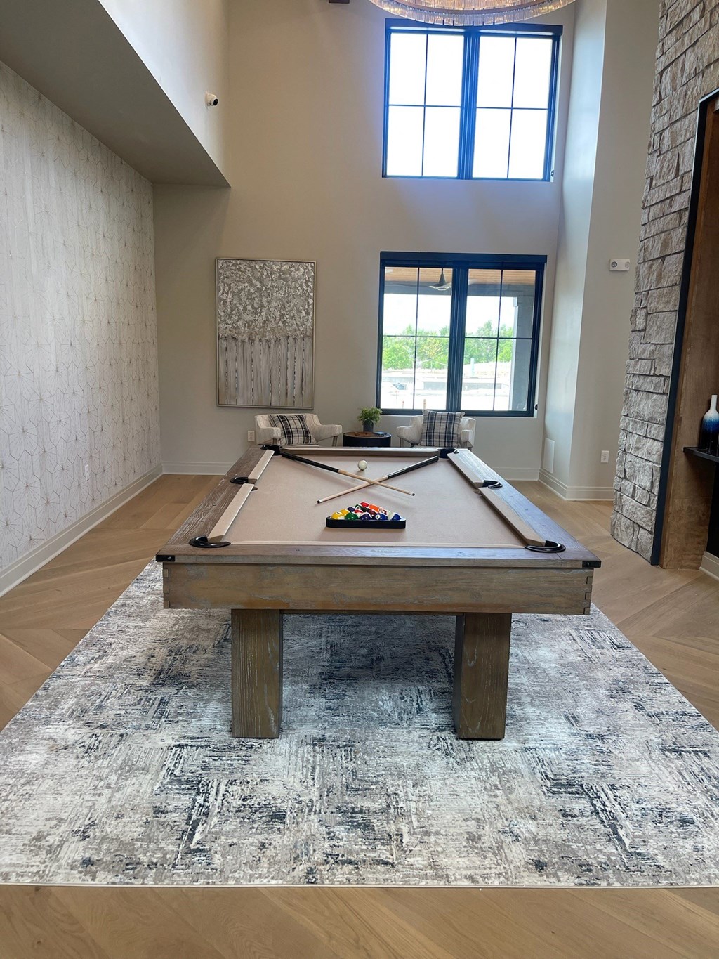 a pool table in a living room in a house