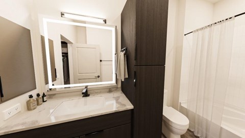 A bathroom with a white sink and a mirror.